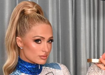 Paris Hilton stuns in sheer pink mini dress and pigtails – and fans all say the same thing